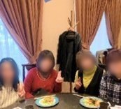 Teachers at a table by the window