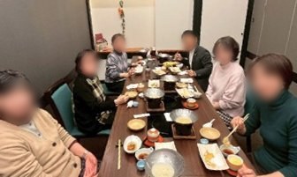 Teachers sharing a hot pot meal